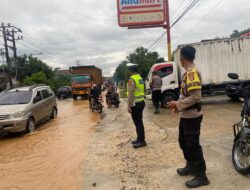 Intensitas Hujan tinggi Ruas Jalinbar di Pringsewu Terendam banjir  